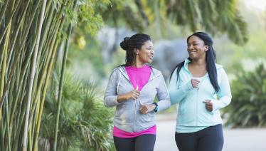 Two women jogging together