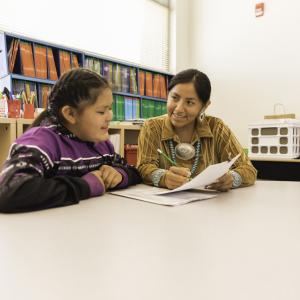 Navajo teacher and student work together on Navajo reservation