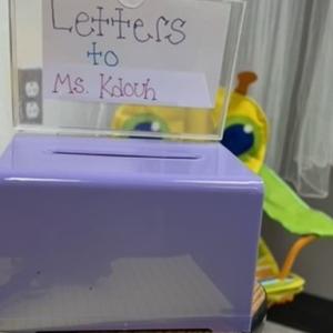 Purple mailbox in classroom